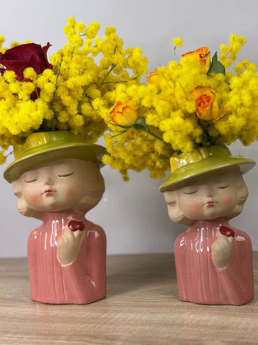 White ceramic head vase with mimosa and various flowers