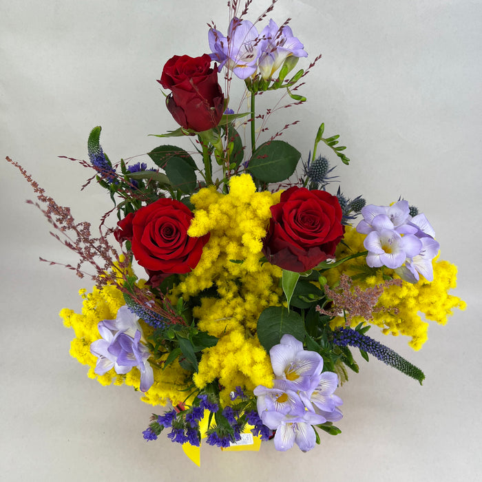 Handbag with mimosa and roses