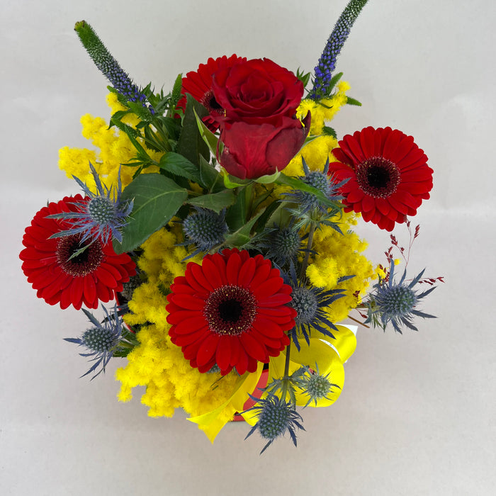 Handbag with mimosa and roses